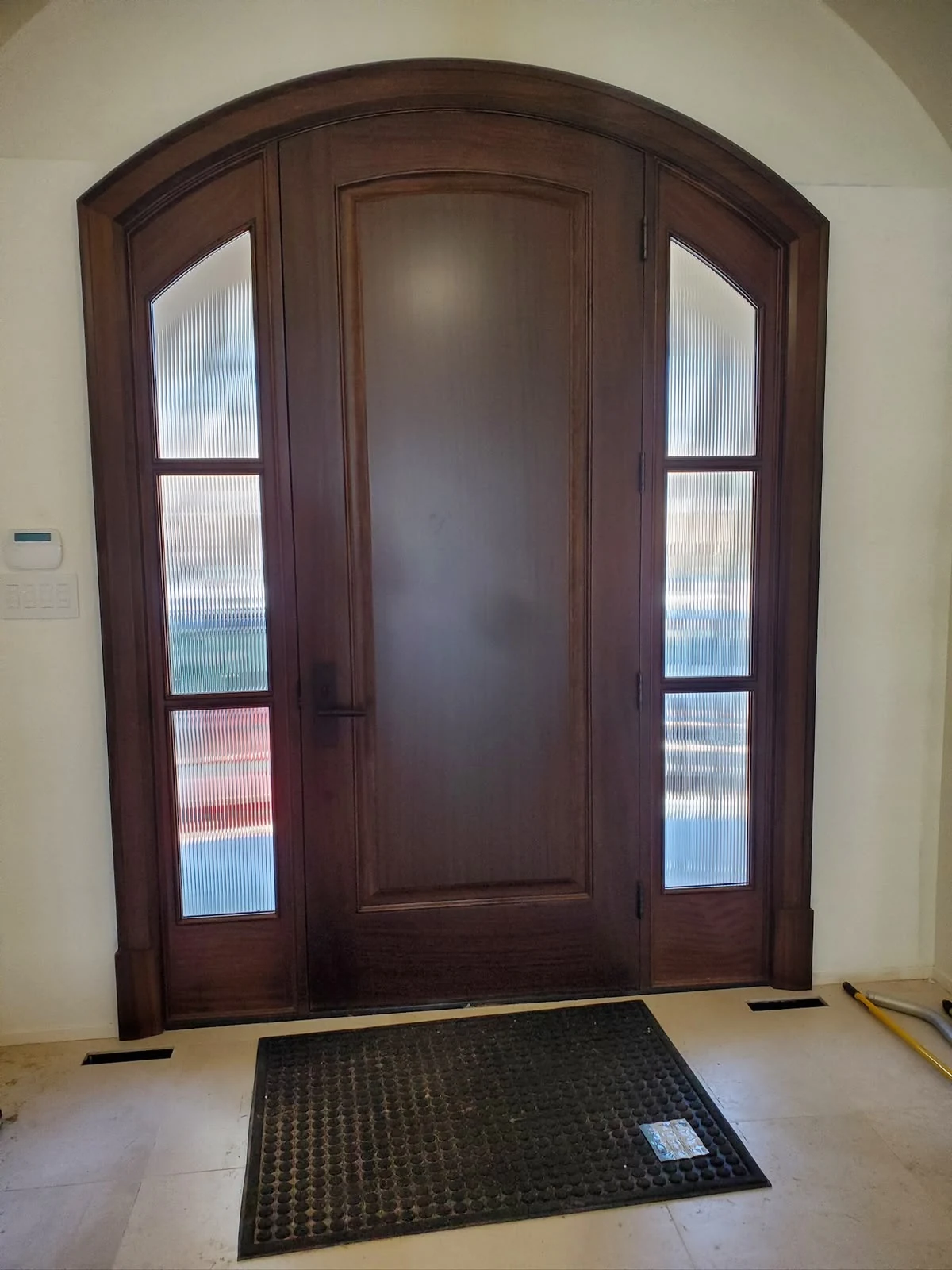 Arched wood entrance — interior view
